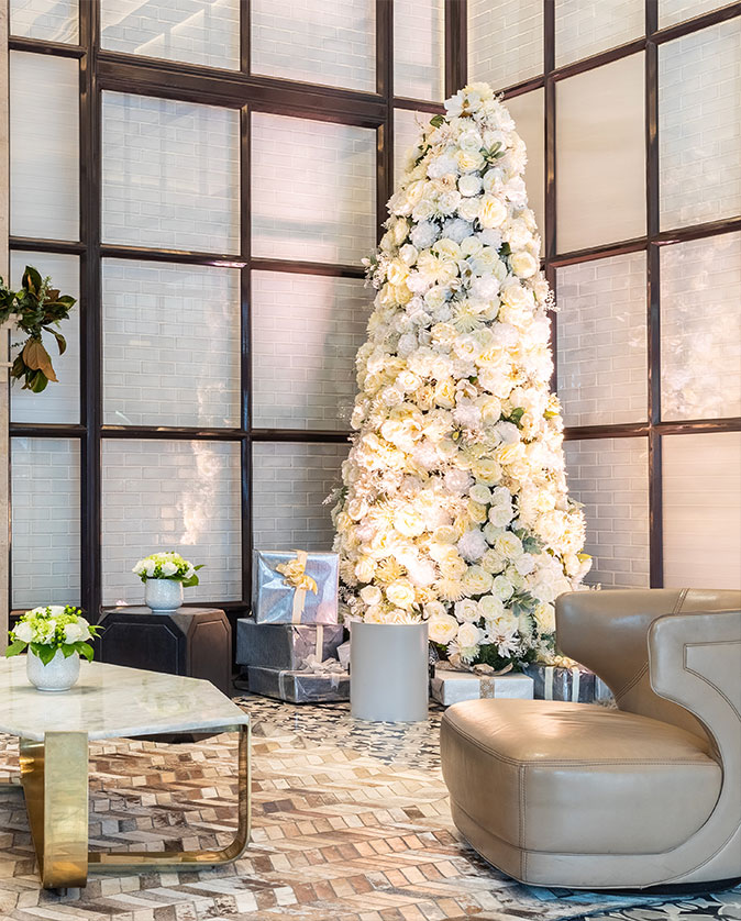 The lobby of Pendry San Diego decorated for Christmas