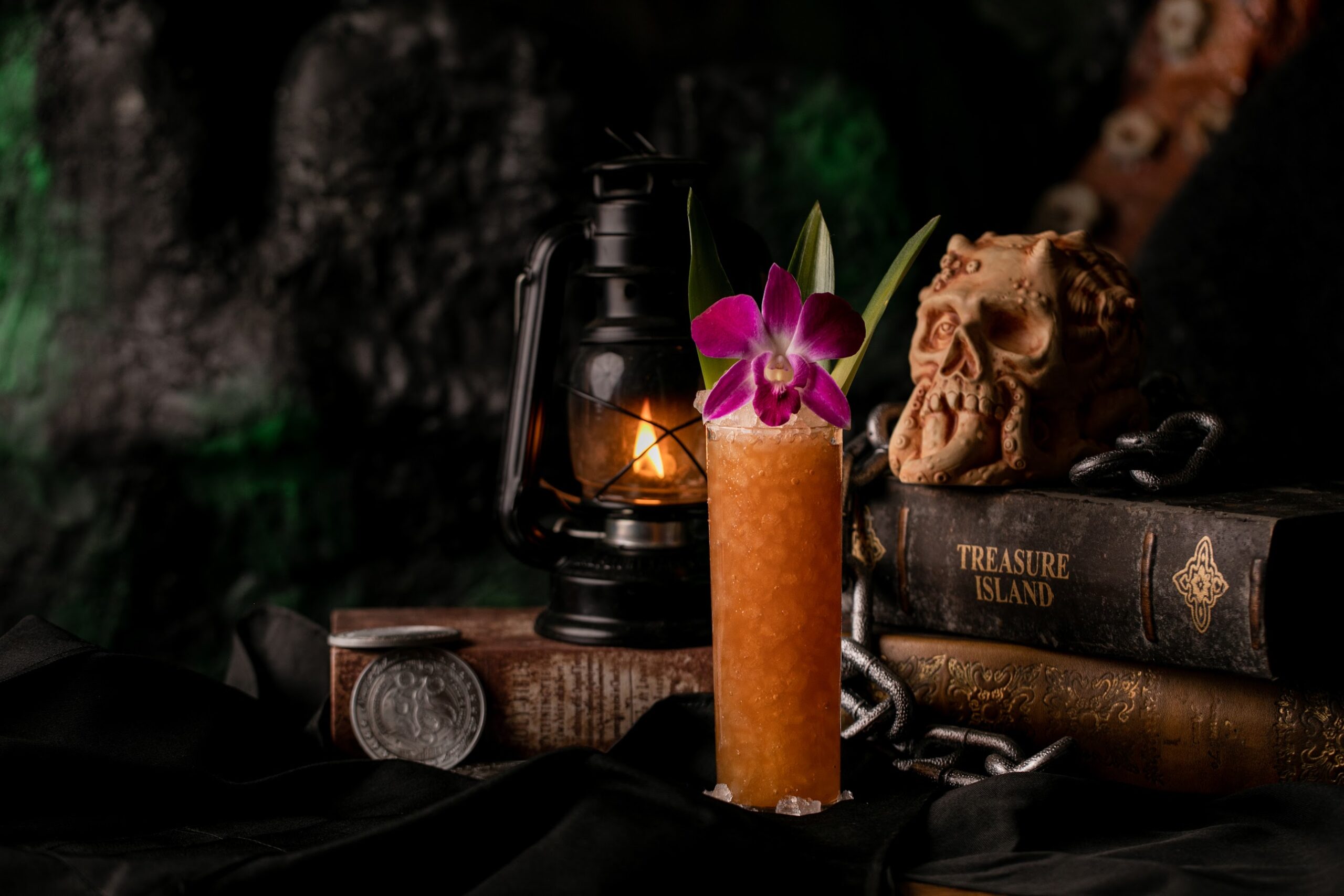 cocktail in front of Treasure Island book