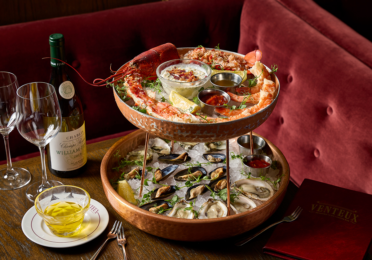Seafood tower and wine at Venteux restaurant at Pendry Chicago.