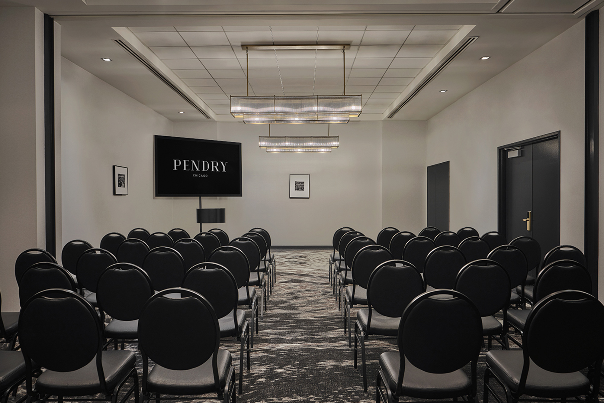Salons one and two at Pendry Chicago set up for a meeting.