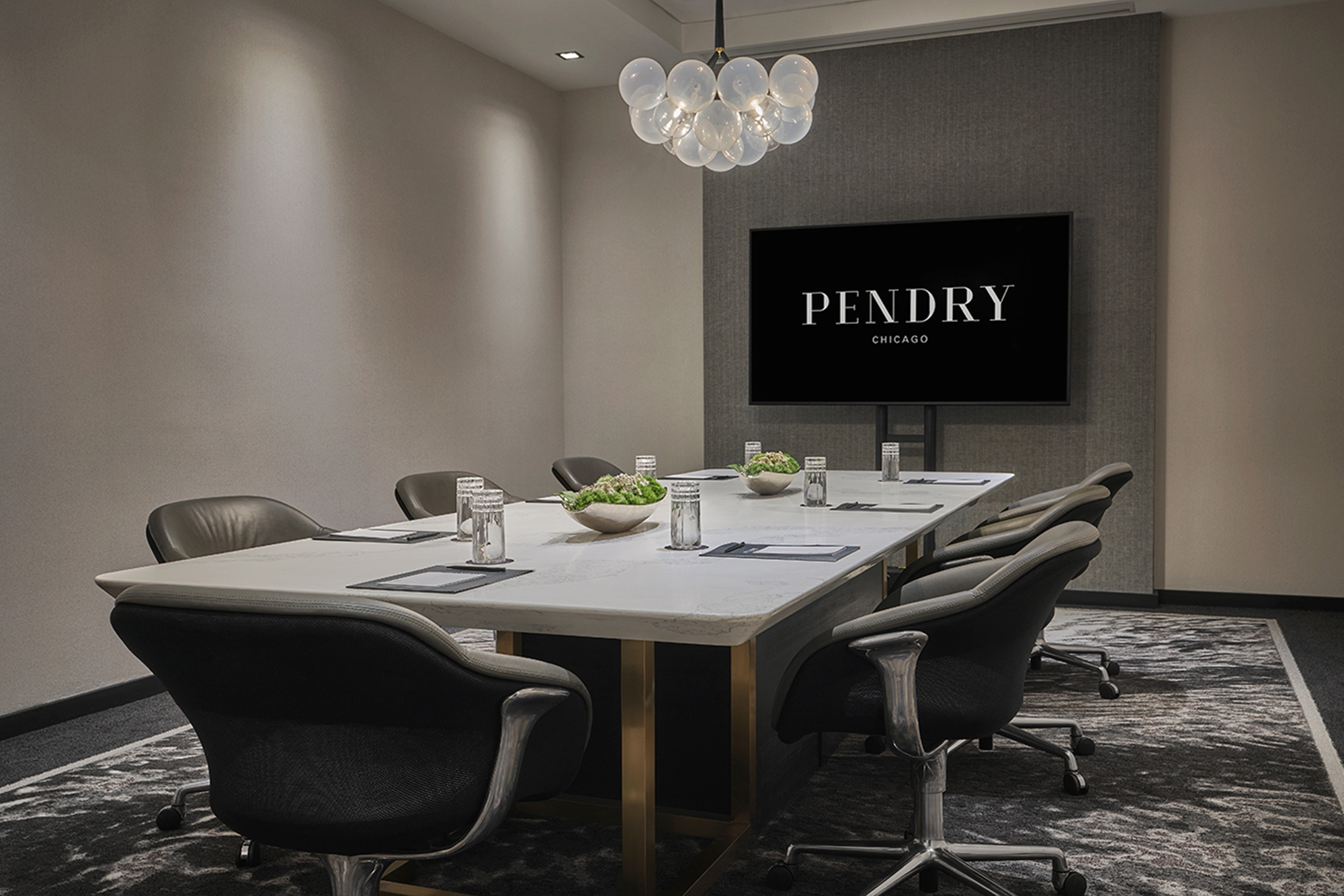 Salon four at Pendry Chicago set up for a meeting.
