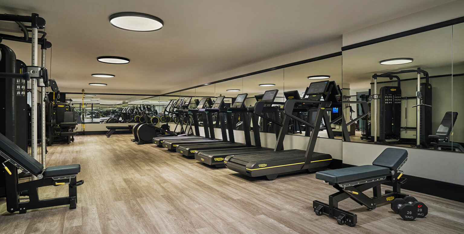 A gym with treadmills and gym equipment in Pendry Chicago