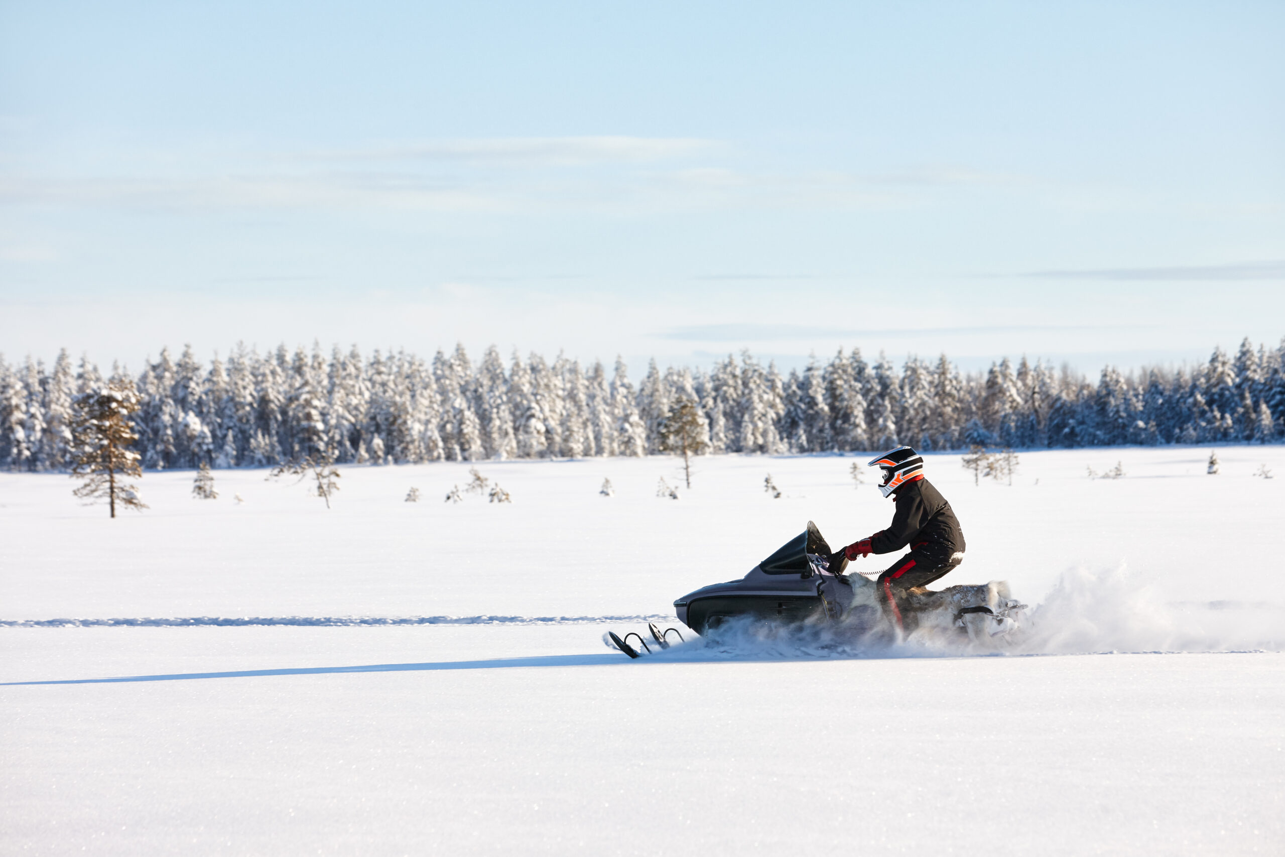 a person snowmobiling