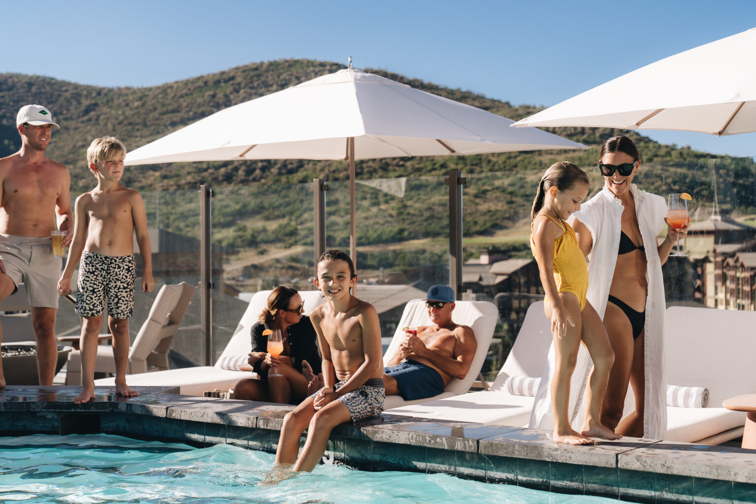 Family enjoying Pendry Park City pool.