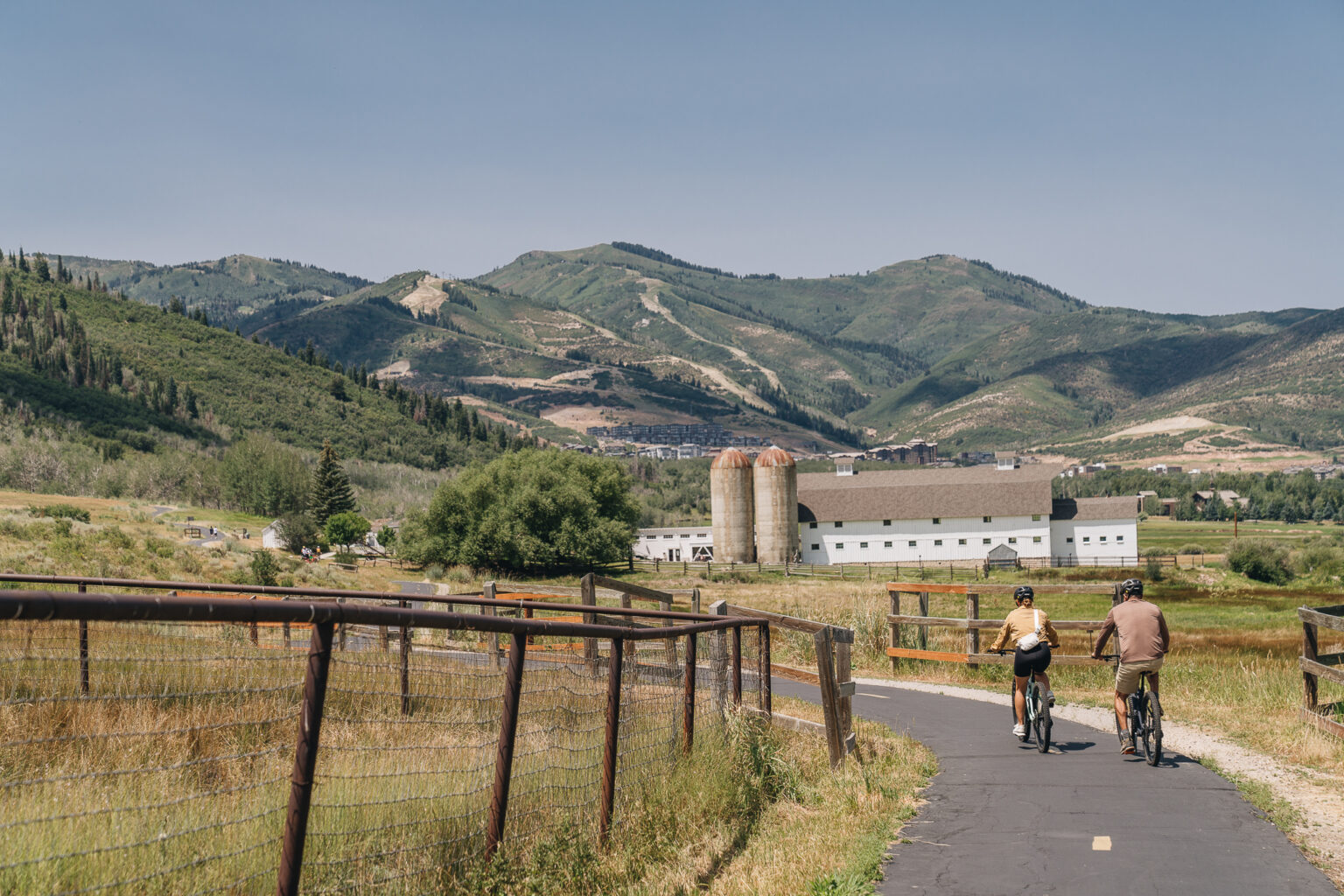 A couple biking in Pendry Park City