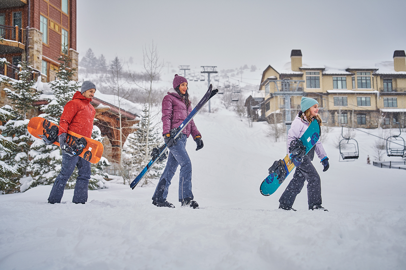 A family skiing at Pendry Park City