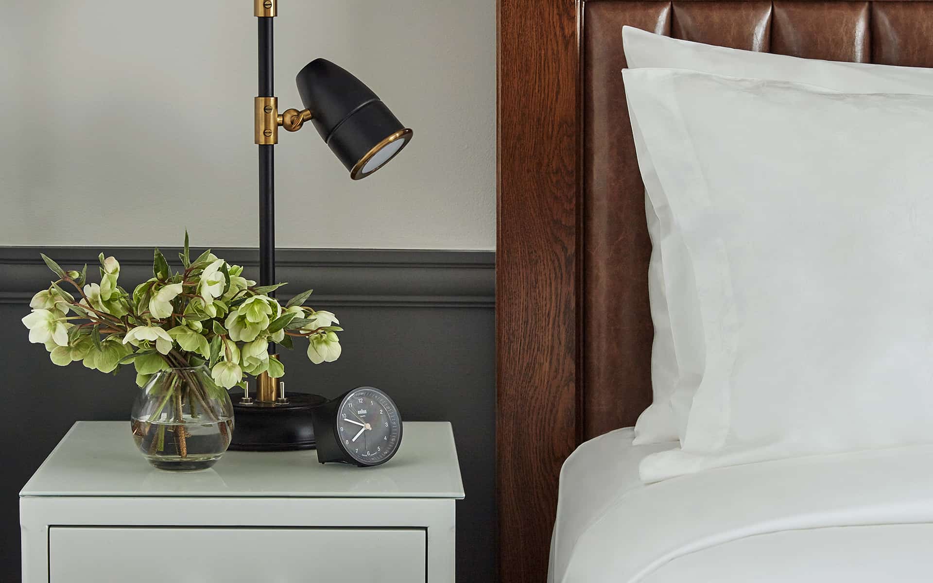 Nightstand and bed view in San Diego boutique hotel