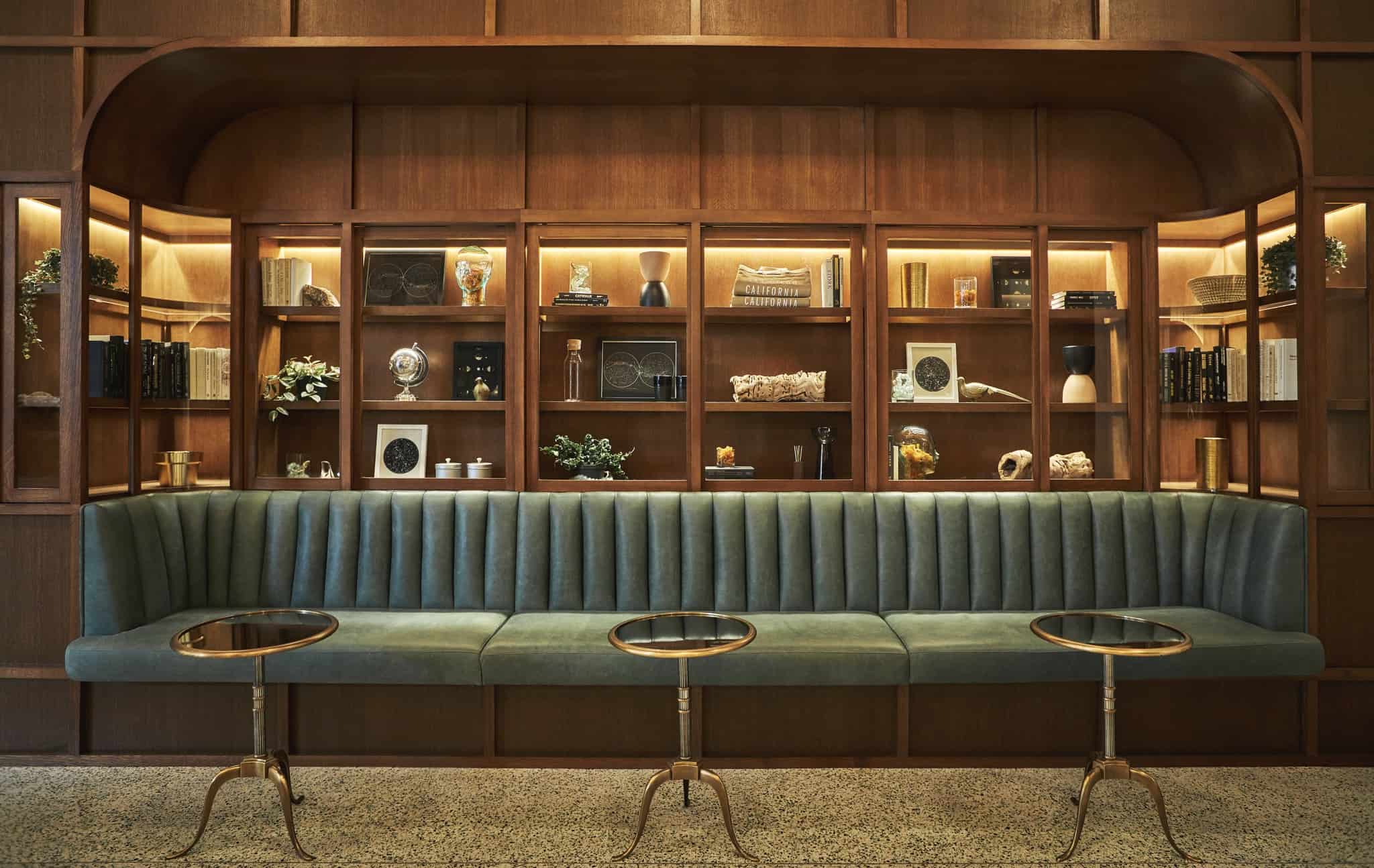 Lounge area with shelves at Pendry San Diego, a luxury hotel in the Gaslamp Quarter
