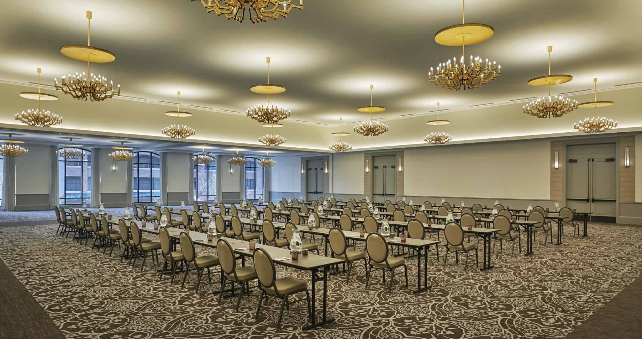 Event room with seating and projector at Pendry San Diego, a luxury hotel