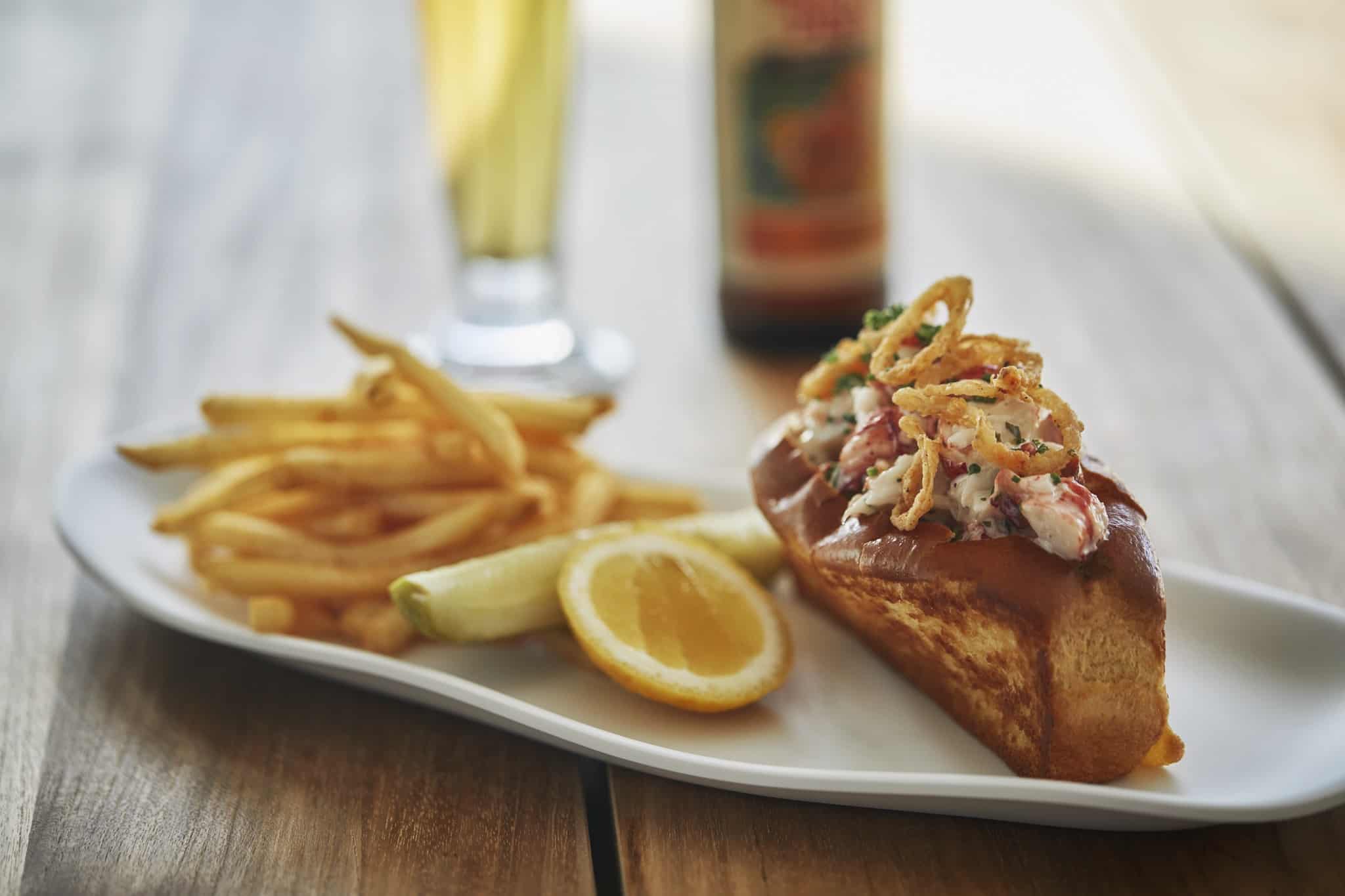 Lobster roll and french fries at boutique hotel in San Diego
