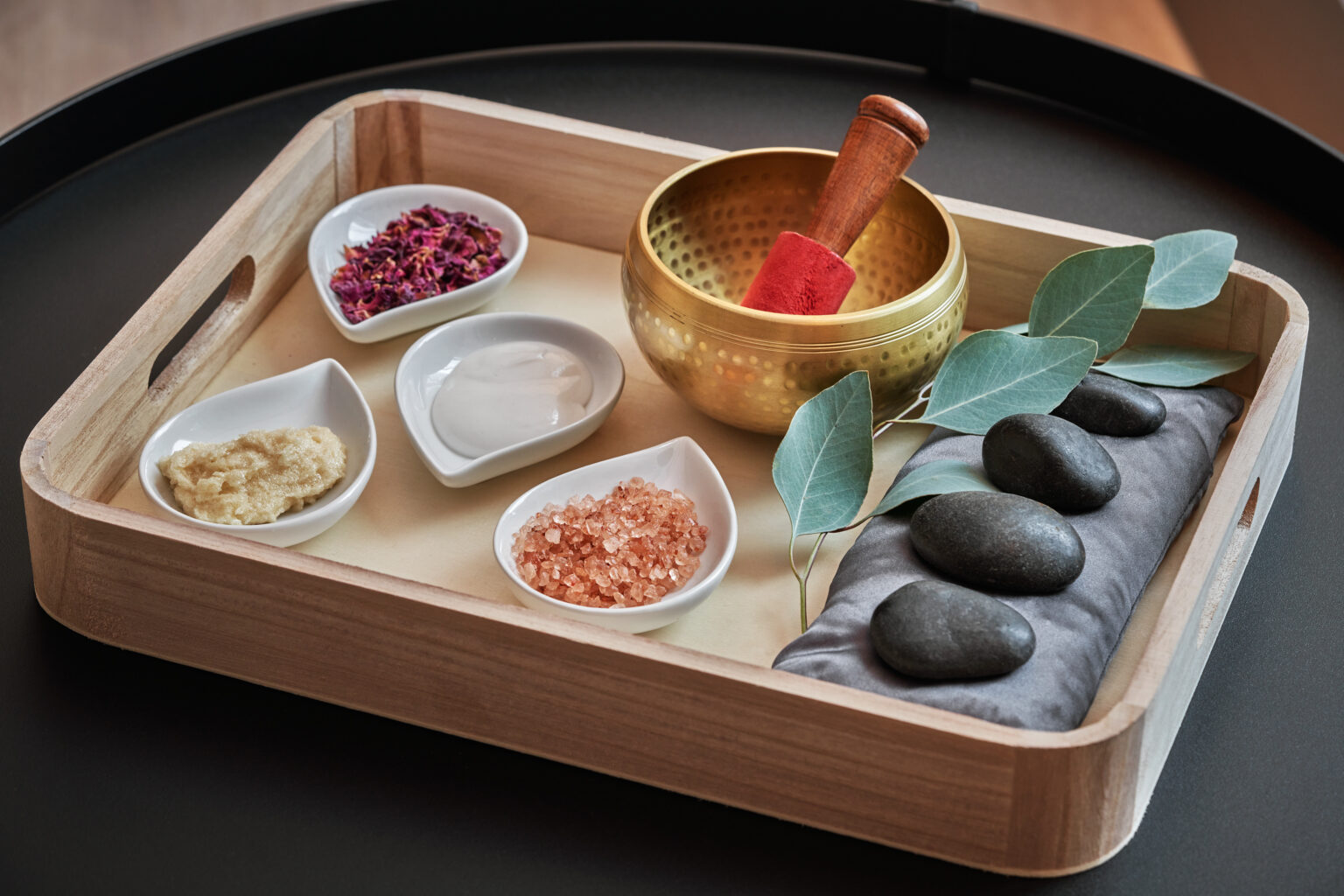Himalayan salts, hot stones, a sound bowl and other colorful spa ingredients at Spa Pendry.