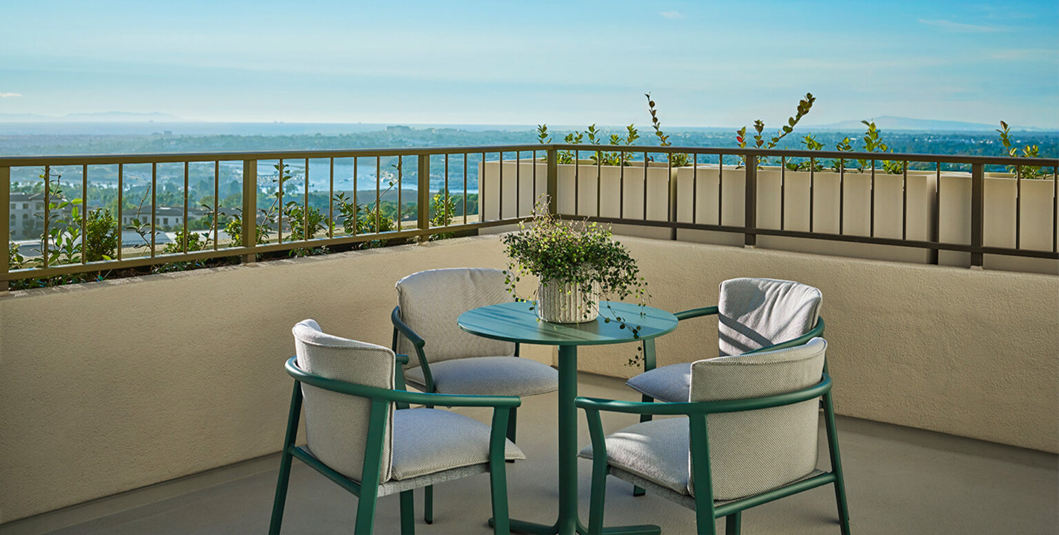 A terrace outside of a suite overlooking Newport Beach at Pendry Newport Beach