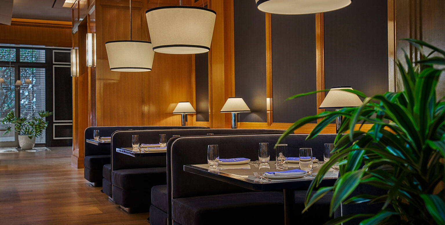 Black booth seats at SET Steak & Sushi at Pendry Newport Beach
