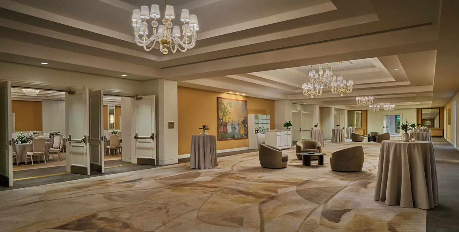 A pre-function room of a wedding reception at Pendry Newport Beach