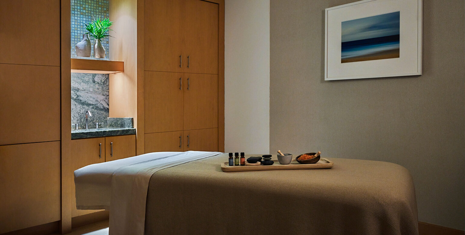A massage table in a private room at Spa Pendry Newport Beach