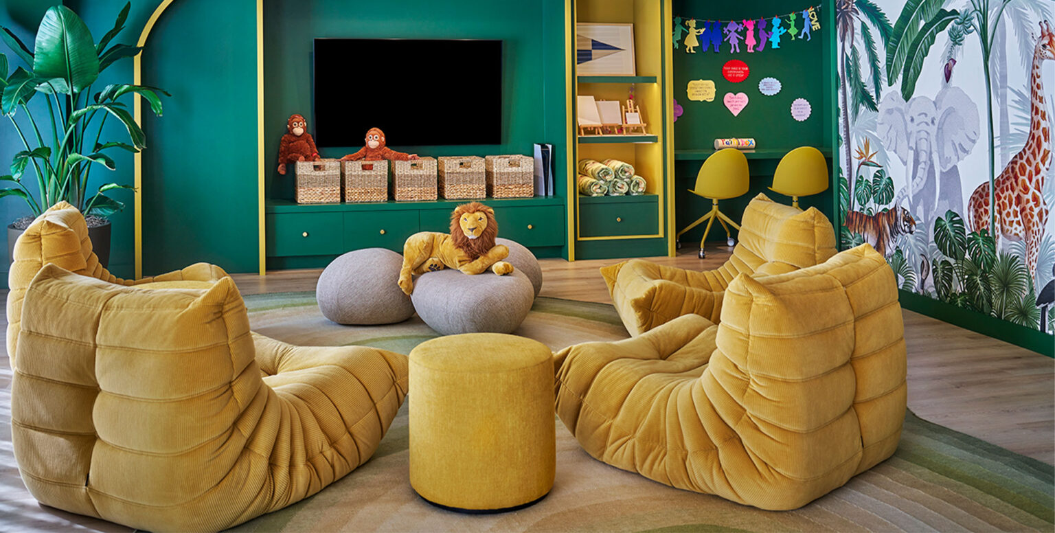 The Paintbox room with yellow bean bags and toys for children to play with at Pendry Newport Beach resort