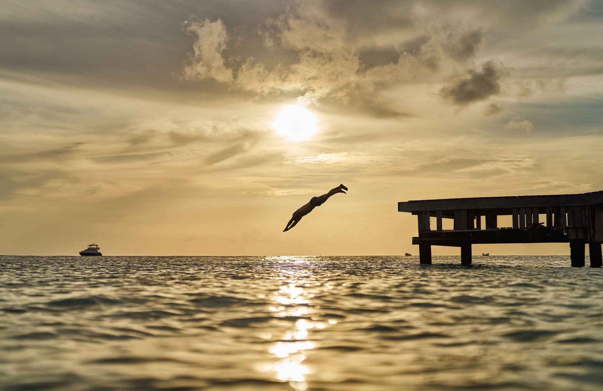 A person diving into the ocean