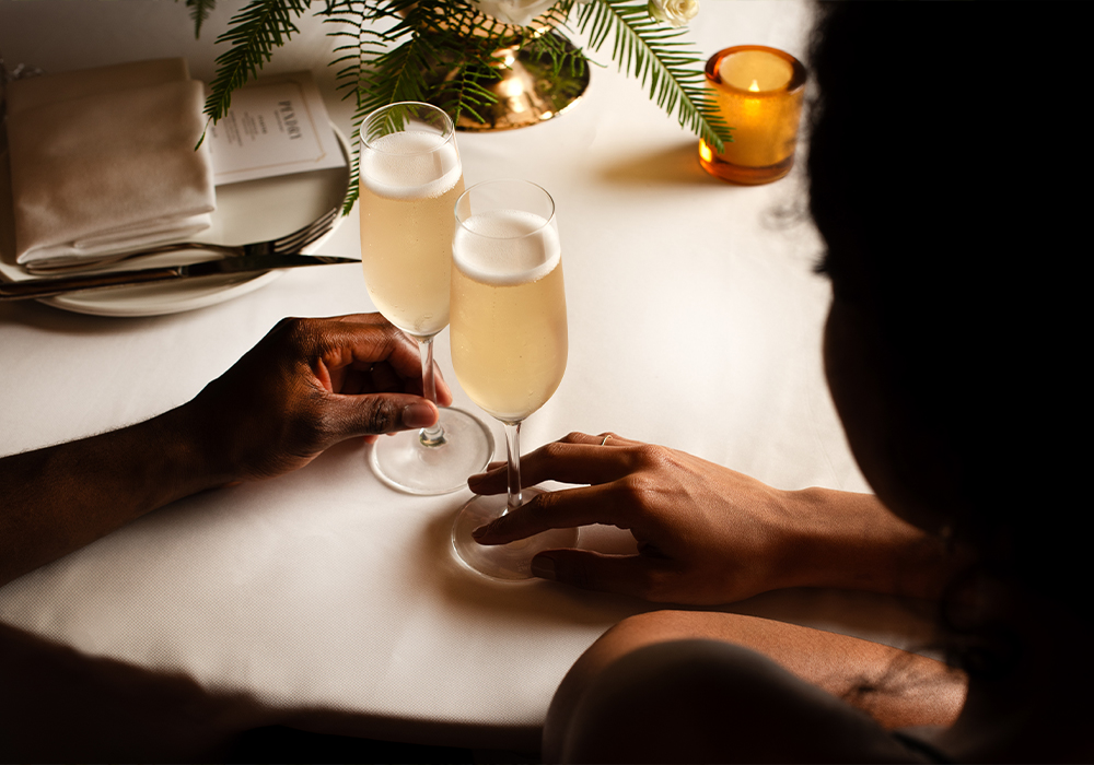 A couple having a glass of champagne