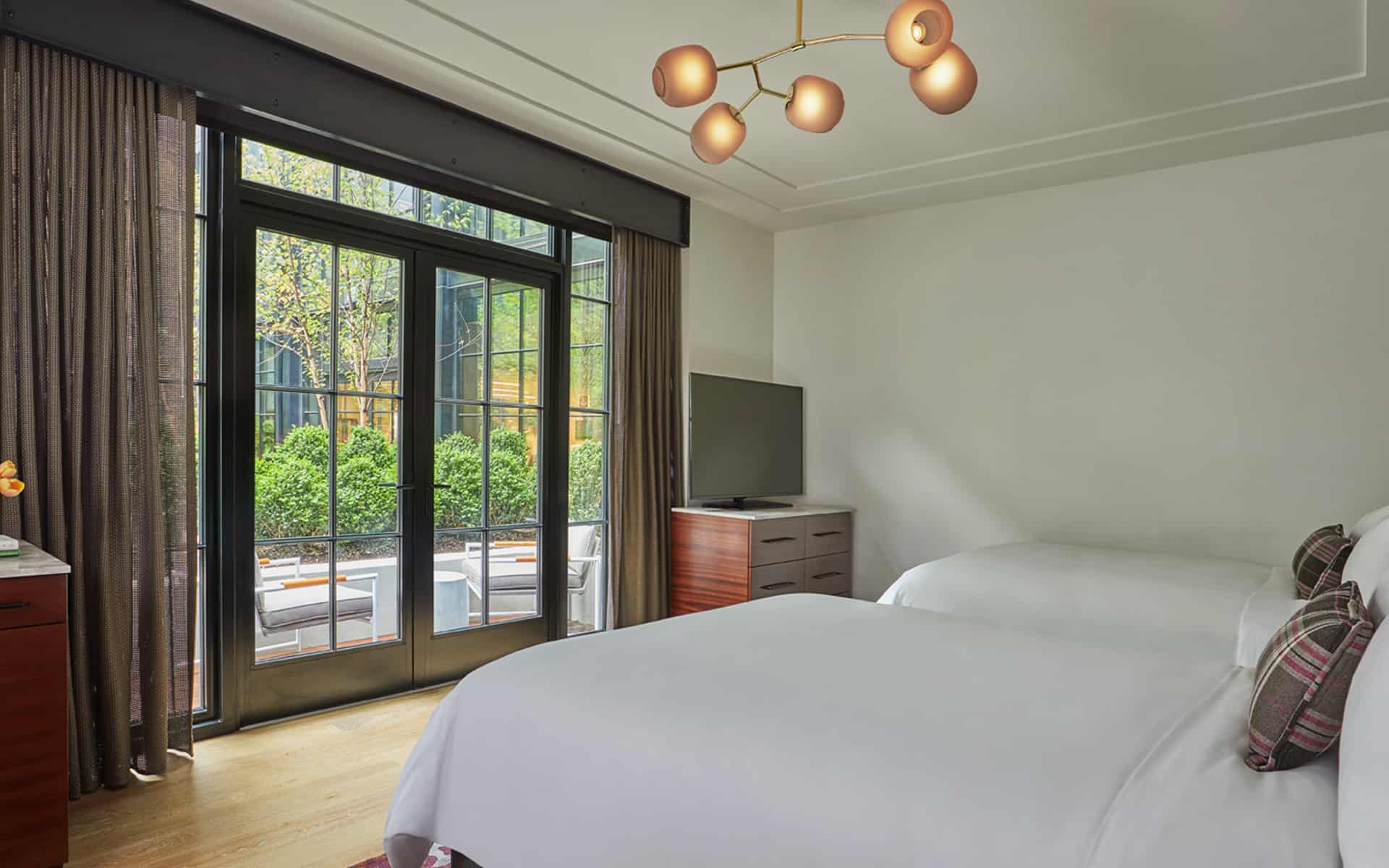 Courtyard two queens bedroom at a luxury Baltimore hotel