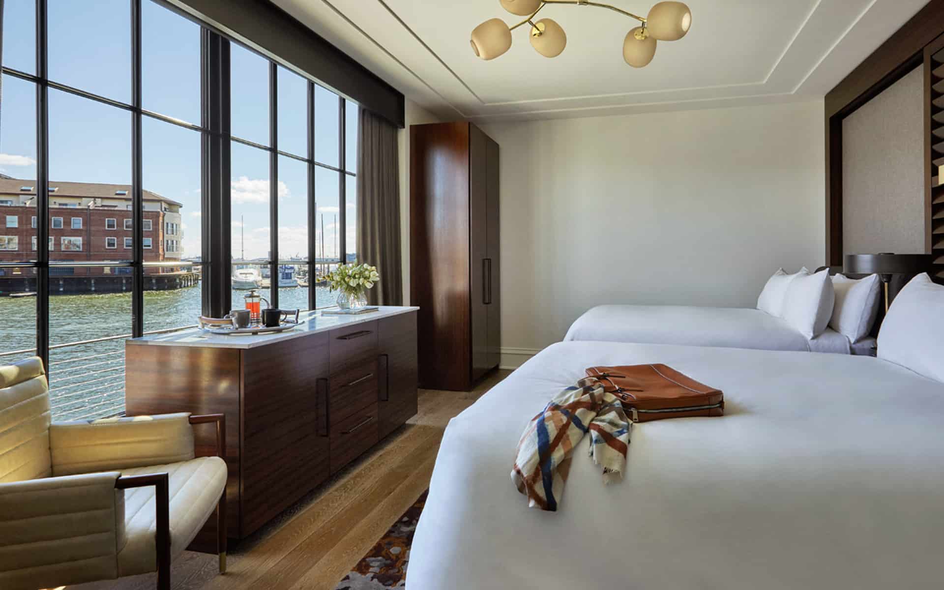 A luxury Baltimore hotel's Harbor Two Queens Room's interior showcasing a large window