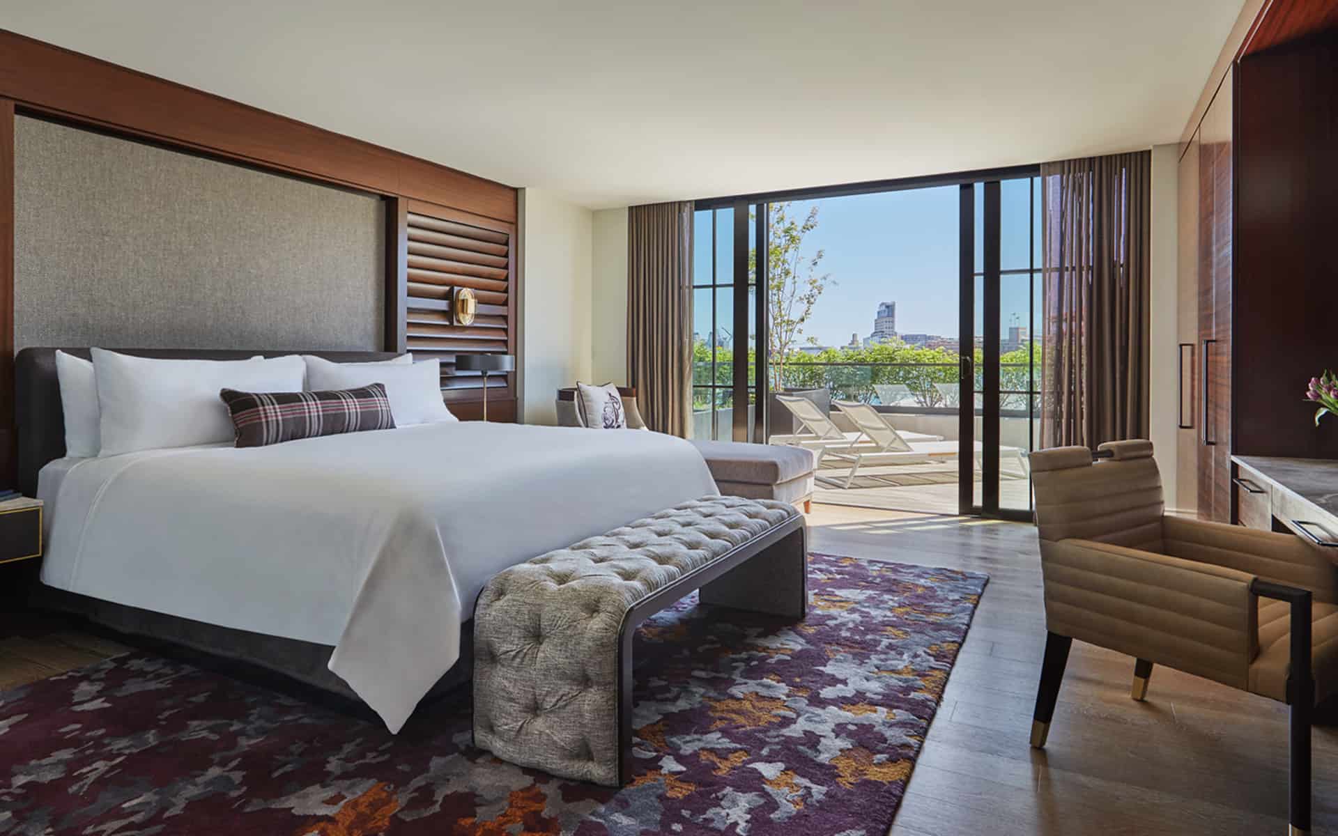 Governor harbor suite bedroom at a luxury Baltimore hotel