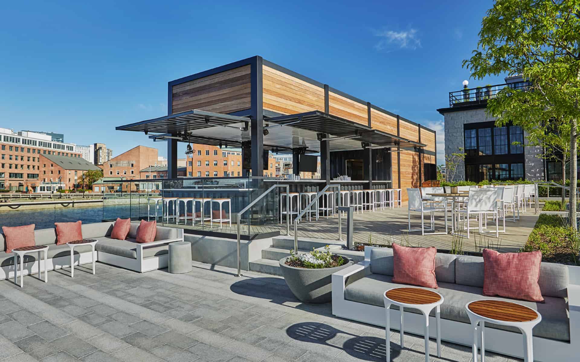 Pool bar exterior during the day at a Pendry hotel in Baltimore