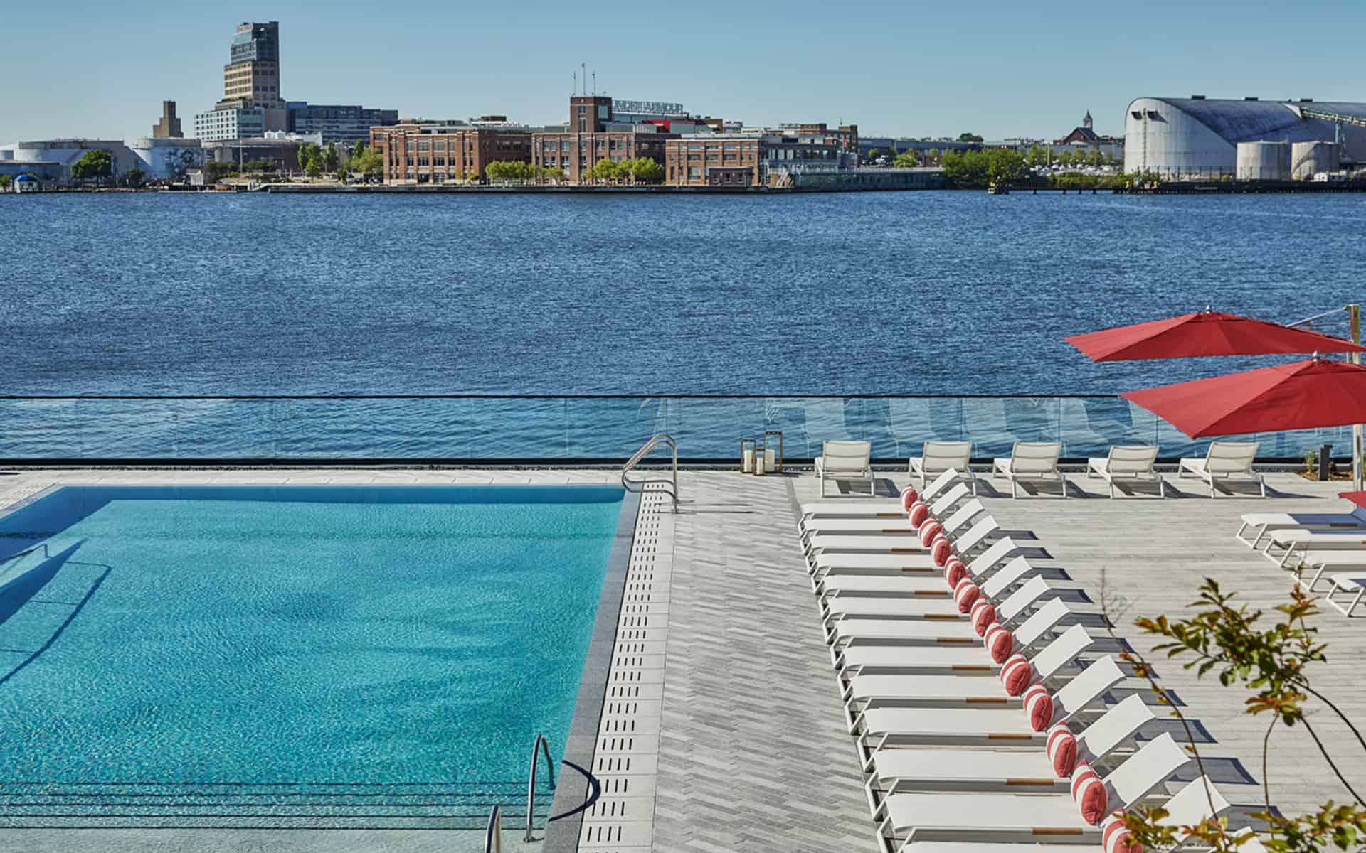 Pool and view of harbor at Baltimore boutique hotel