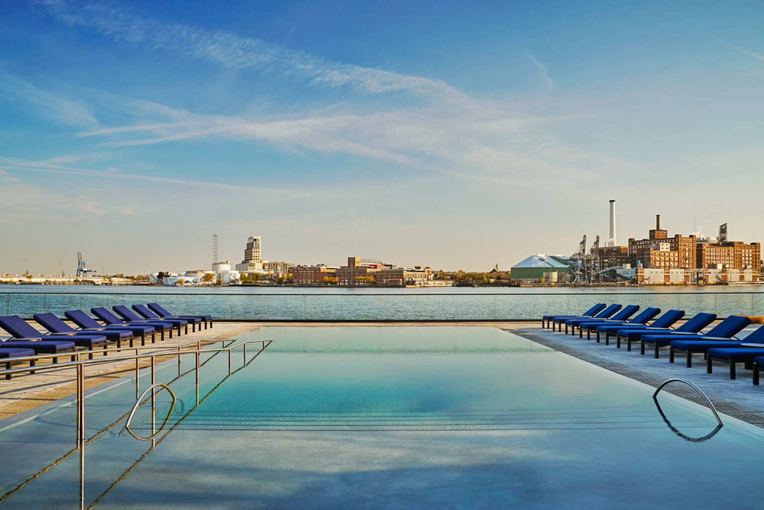 Pool and view of harbor at Baltimore boutique hotel