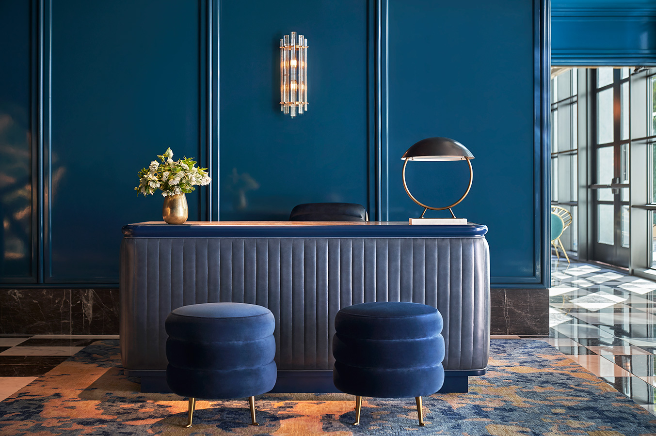 Desk and stools in the lobby at Pendry West Hollywood a luxury hotel on sunset blvd