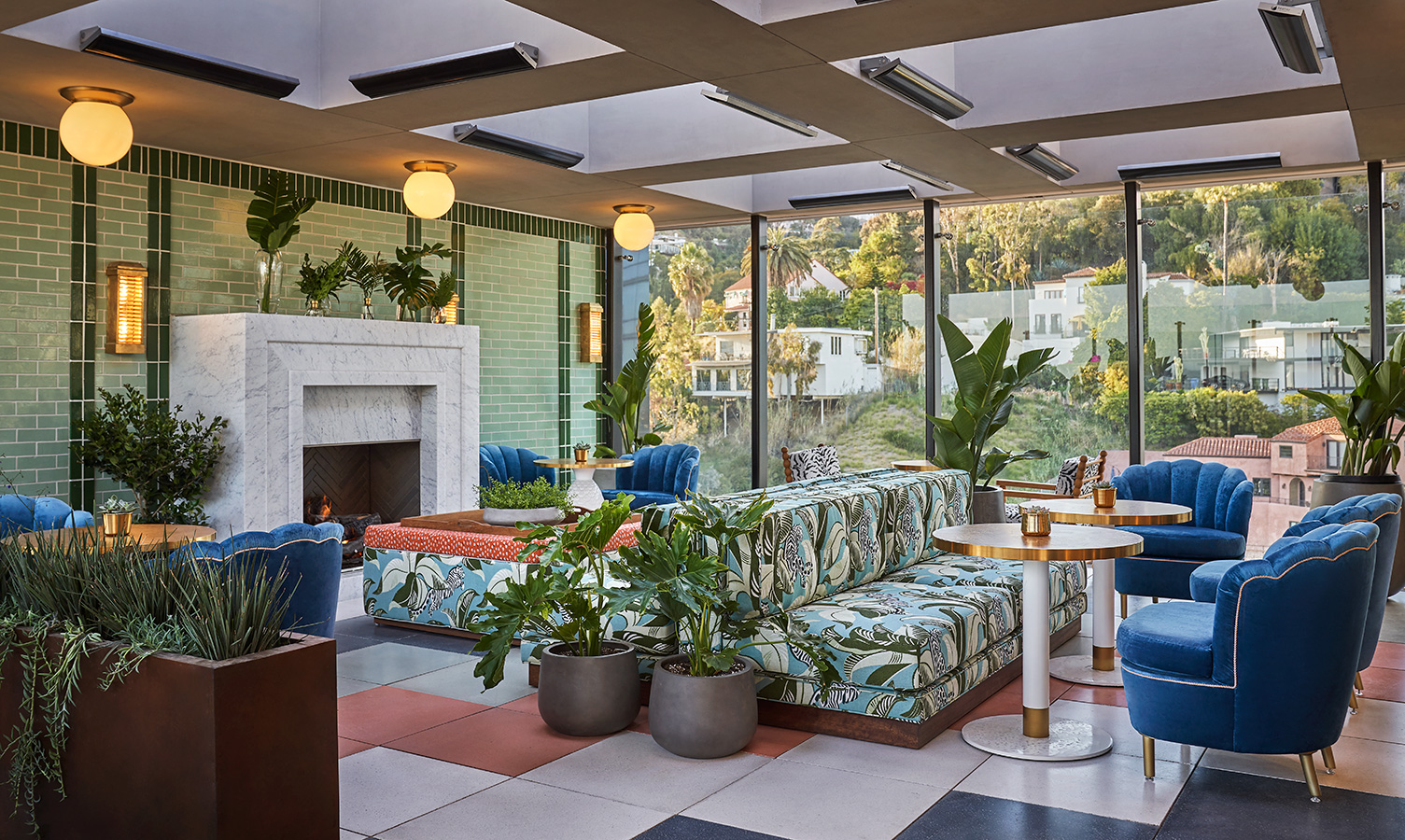 Merois Bar with seating and views of city at Pendry West Hollywood, a luxury weho hotel