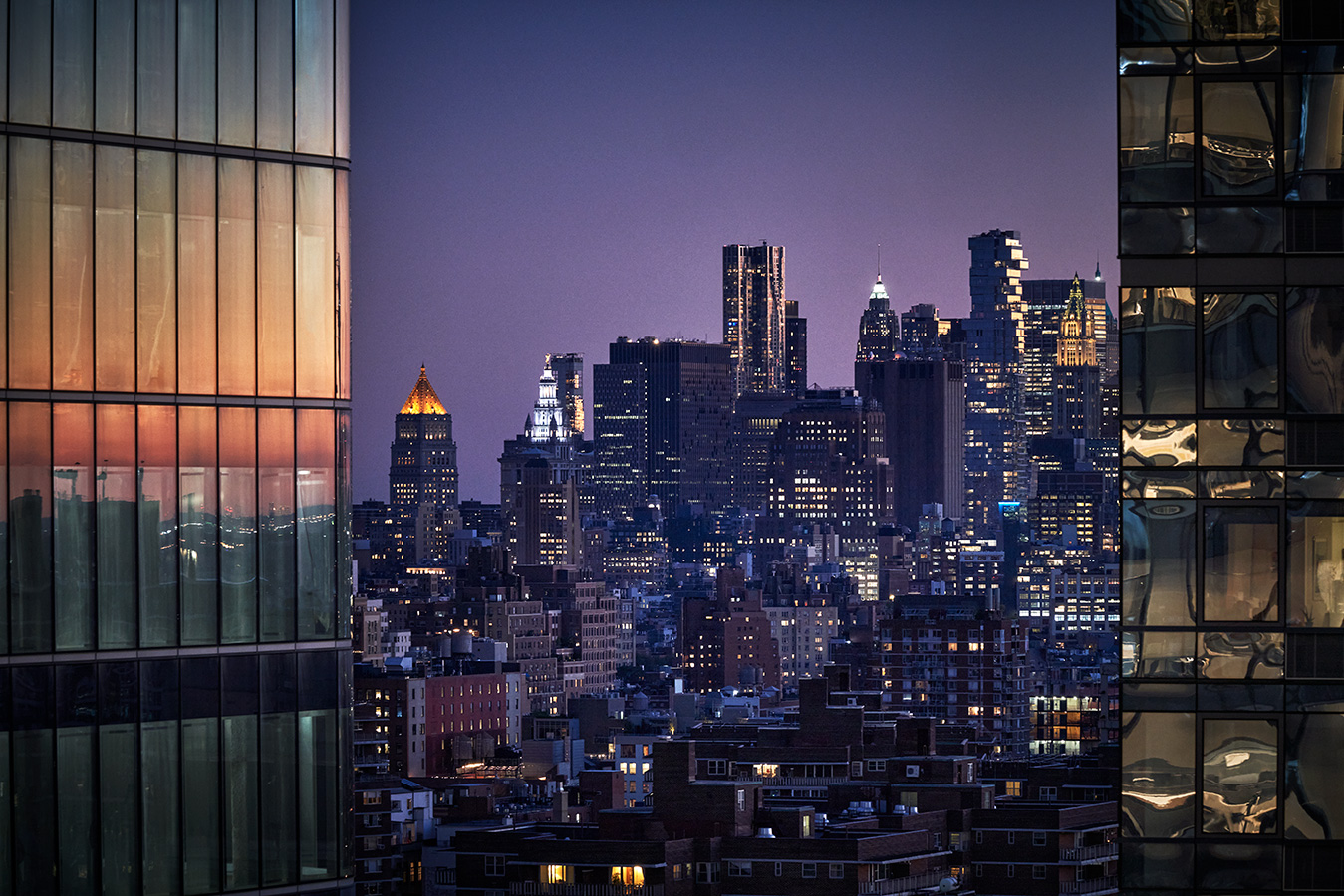 View of the Manhattan skyline at night from Pendry Manhattan West.