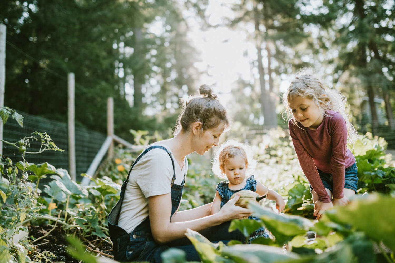 Two women and a baby in a garden
