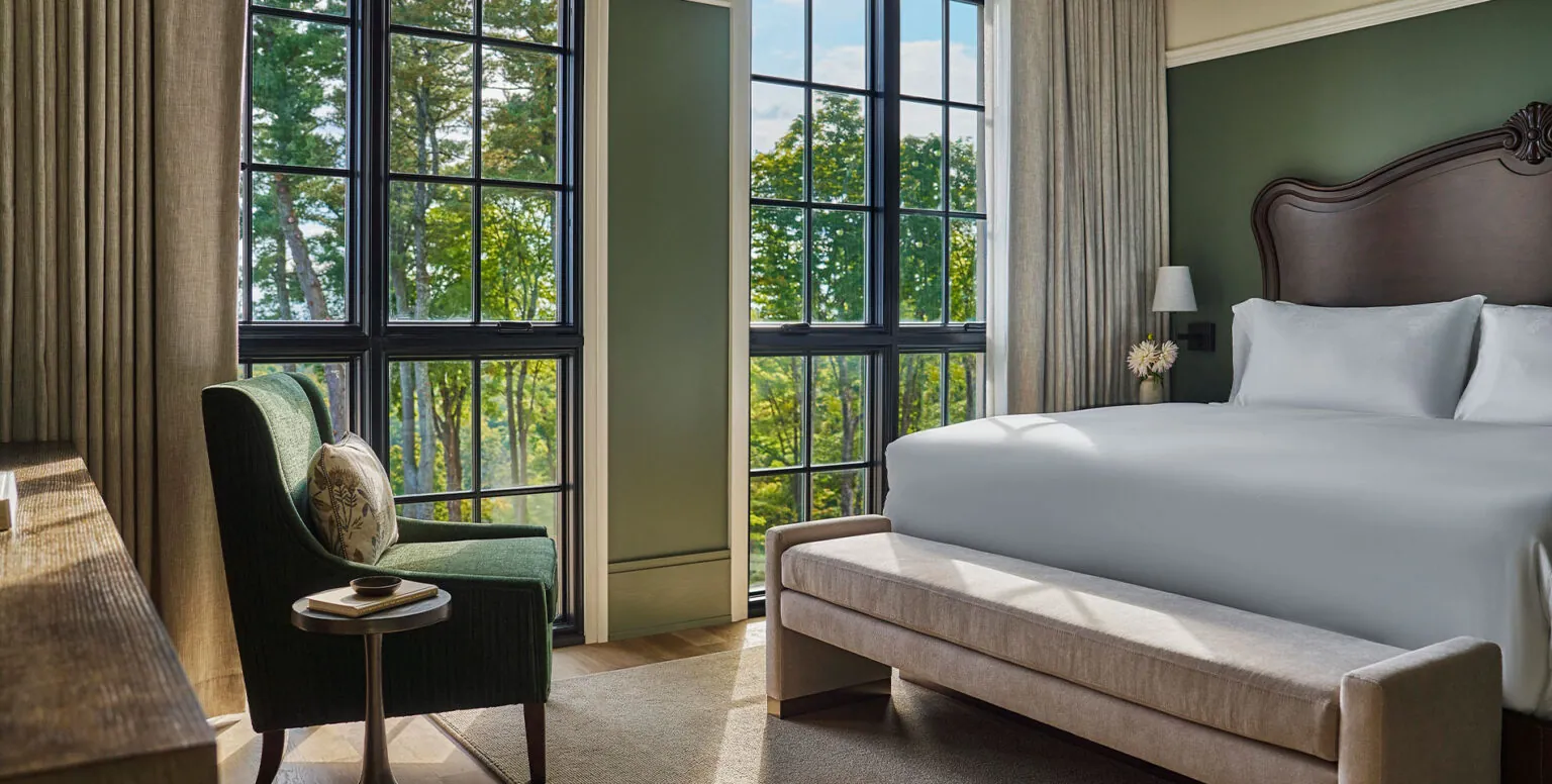 A guestroom at Pendry Natirar with floor to ceiling windows