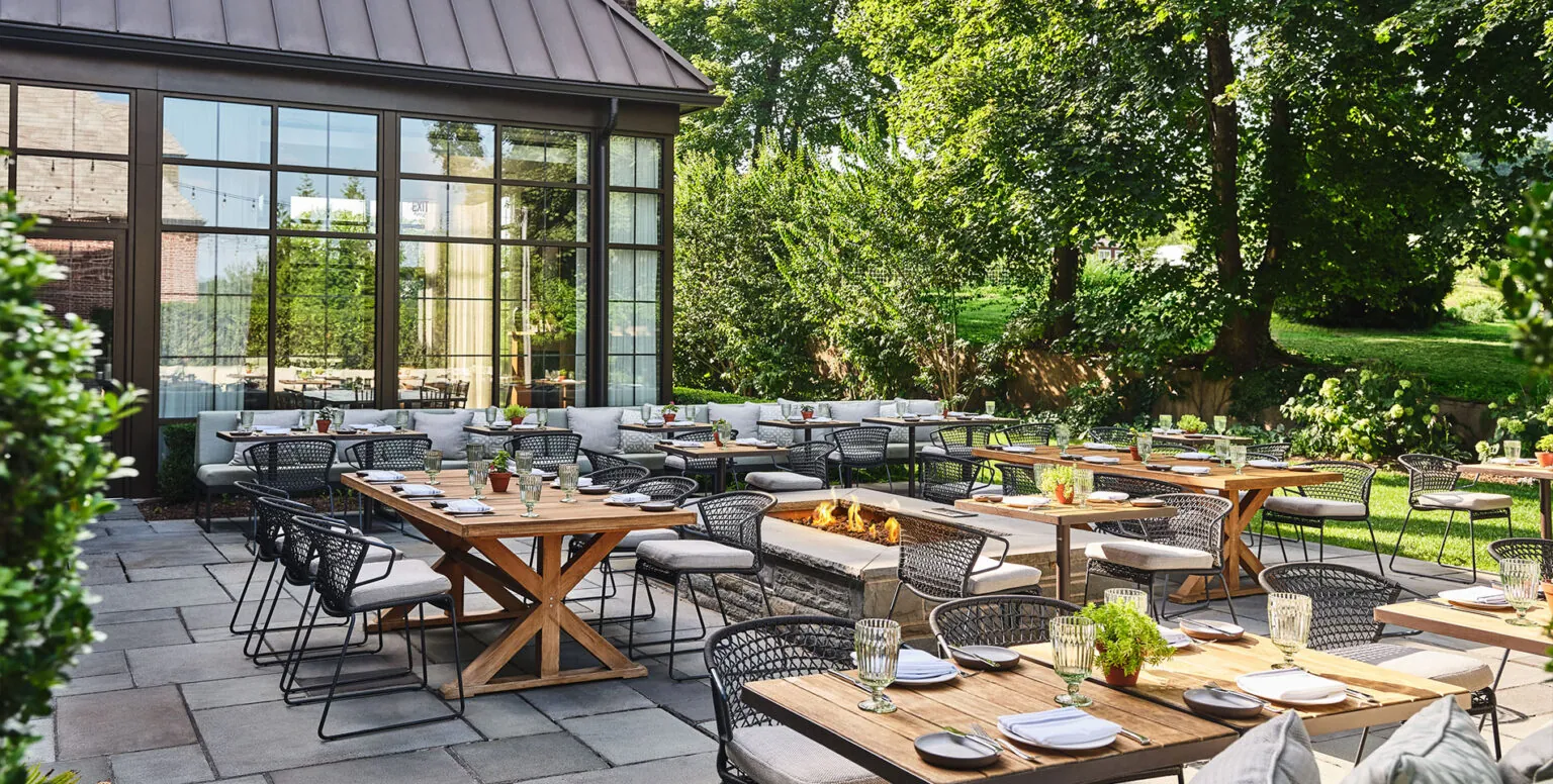 Outdoor dining patio at Ninety Acres at Pendry Natirar