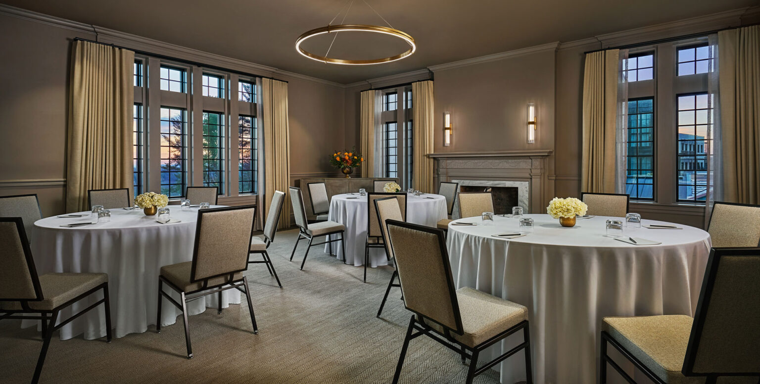 Three tables in a meeting space at Pendry Natirar