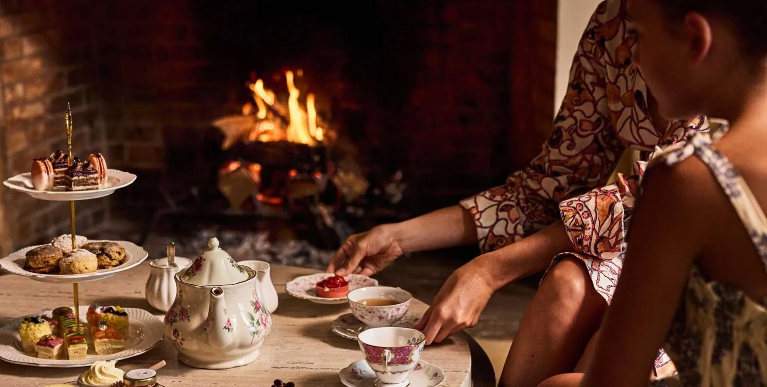 Two women having a tea party at Pendry Natirar