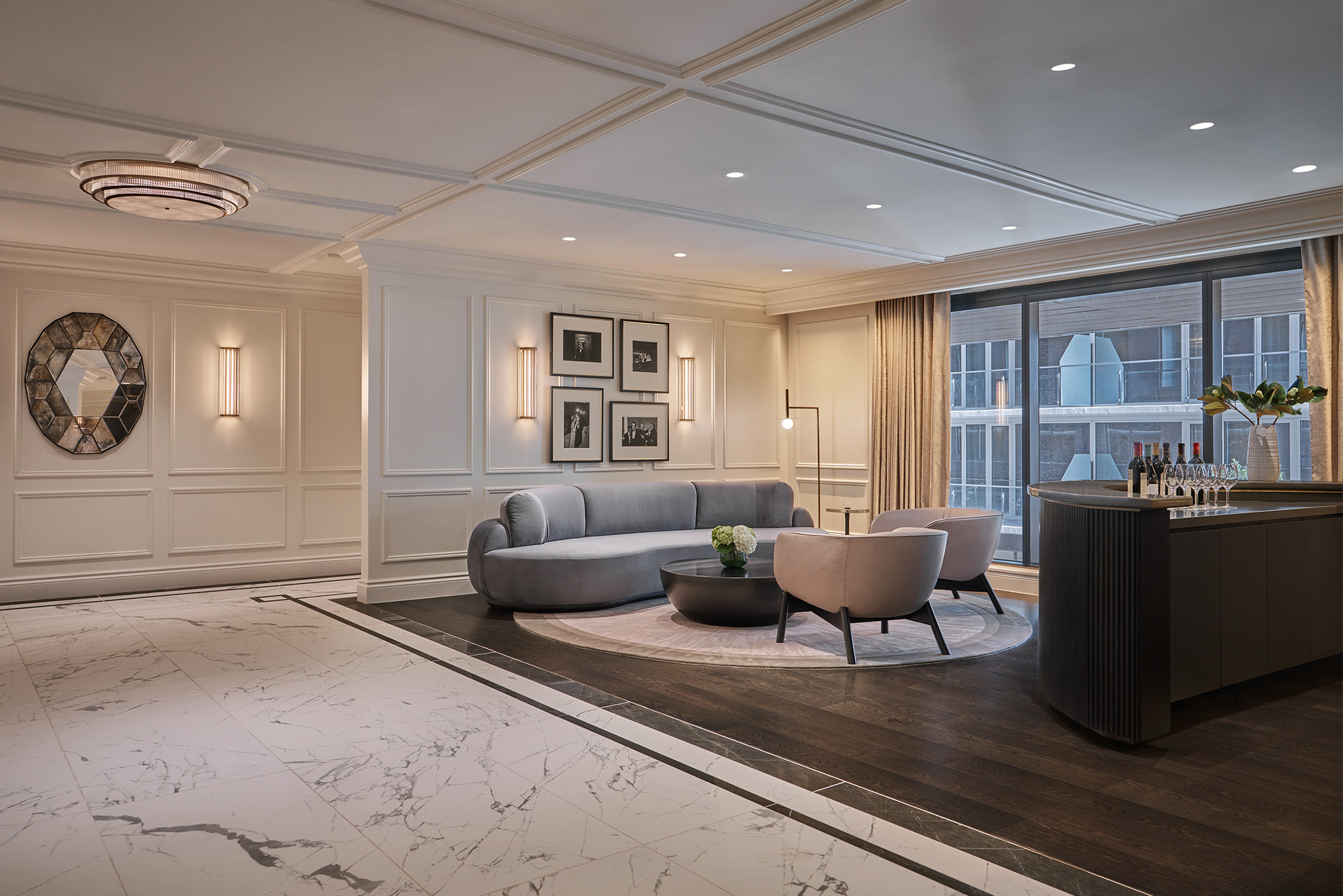 Pre-Function event space at Pendry DC with modern furnishings, marble floors, and city views through large windows.