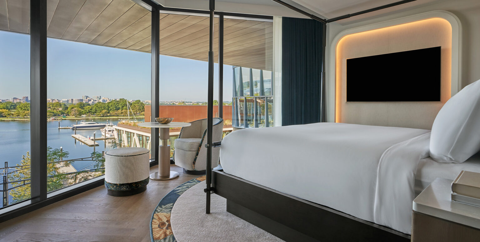 A guestroom at Pendry Washington DC &ndash; The Wharf with a riverfront view